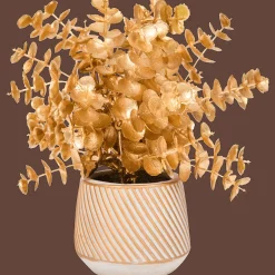 Gouden kunstplant in pot