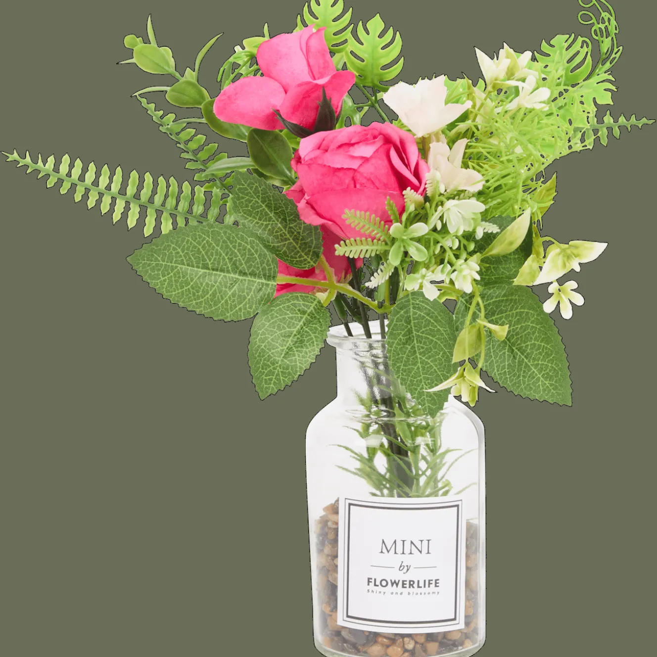 Kunstbloemen in glazen fles